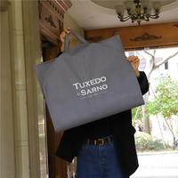 Sac de rangement pliable en non-tissé pour vêtements, avec poignées, réutilisable, pour costumes et robes, idéal pour les voyages, personnalisable avec logo, vente en gros