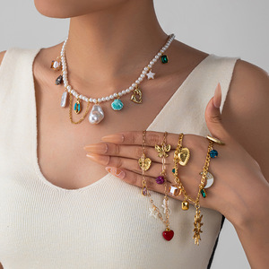 HOVANCI 18 Karat vergoldeter Edelstahl Einfache runde Muschel Anhänger Schlangen kette für Hochzeits anlässe Glieder kette für Mädchen - Product Image 2