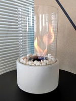 Cheminée bioéthanol au design moderne, autoportante, d'intérieur, ronde, avec plateau blanc en acier inoxydable