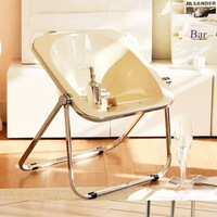 Chaise de salle à manger pliable moderne minimaliste en plastique avec dossier transparent et pieds en métal