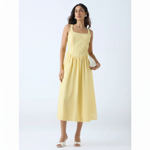 ชุดเดรสทรงเอเนื้อสัมผัสสีเหลืองอ่อน - Product Image 1