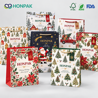 Sac en papier cadeau de Noël HONPAK, sac de shopping personnalisé imprimé pour les fêtes avec poignée en corde pour l'emballage de vente au détail saisonnier