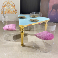 Table de salle à manger en verre miroir de forme triangulaire unique pour les fêtes de mariage