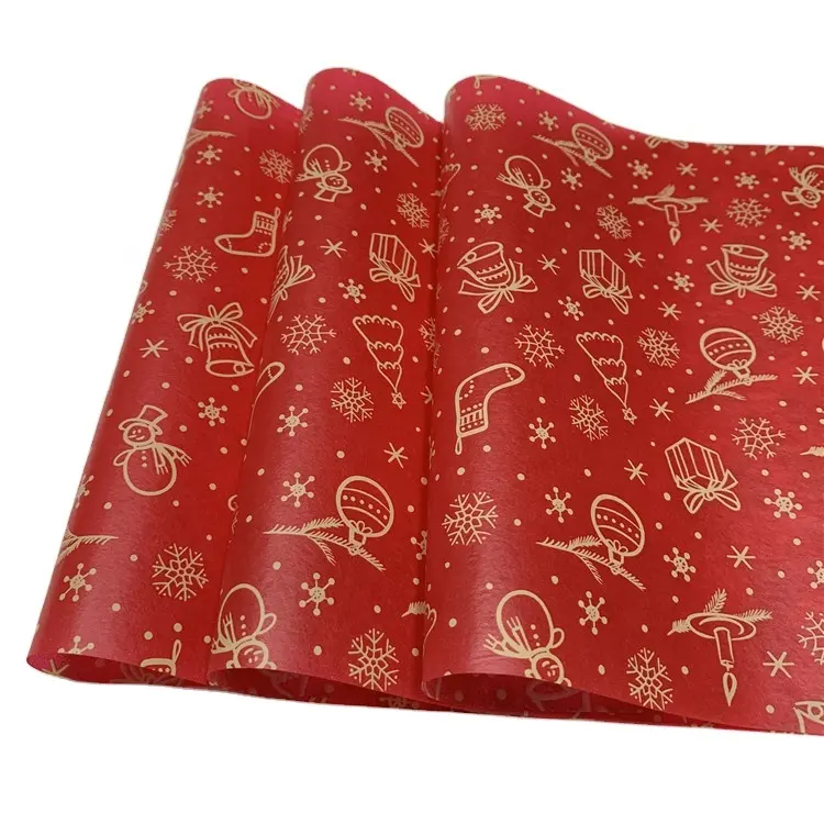 Rotolo di carta da regalo con carta velina stampata con logo natalizio