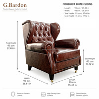 Fauteuil Chesterfield classique en cuir véritable marron capitonné avec dossier haut pour bar à domicile et salon de cigares