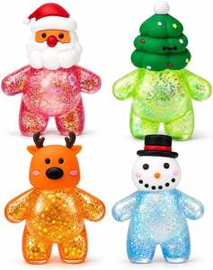 Lot de 4 jouets squishy de Noël brillants en TPR, jouets anti-stress souples à presser, style mignon Père Noël, décorations d'arbre, cadeaux de Noël - Product Image 1