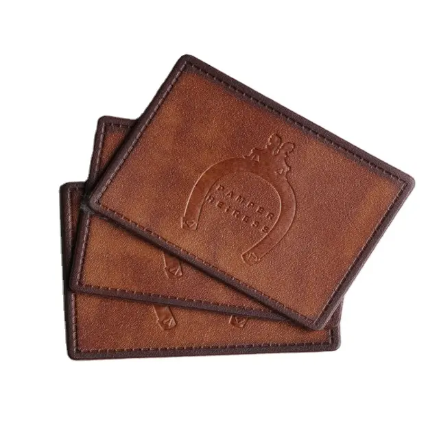 Customized brand main label PU logo embossed leather labels for jeans clothing wholesale