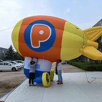 Ballon suspendu décoratif de toit de modèle de dirigeable publicitaire géant gonflable de 6m coloré IP personnalisé garantie d'un an