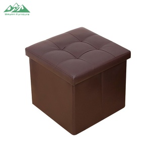 Banc ottoman pliable compact et peu encombrant en cuir noir avec rangement caché - Product Image 5