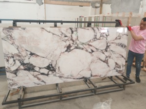 Piedra Sinterizada de Gran Formato 2700x2400mm, Losa de Porcelana Italiana Blanca Brillante, Azulejos Pulidos y Esmaltados para Paredes y Pisos para Proyectos - Product Image 1