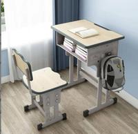 Ensemble de mobilier scolaire de conception moderne pour salle de classe, bureau et chaise pliables pour élèves du primaire, en métal