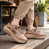 Chaussures de sport noires personnalisées avec logo OEM, design à boucle, respirantes, en maille souple, pour la marche et les loisirs