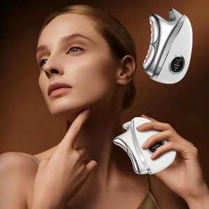 Outil de massage facial électrique anti-âge avec 3 niveaux de chaleur pour éliminer les rides et les poches - Product Image 1