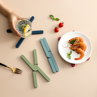 Sous-plat en silicone résistant à la chaleur, antidérapant, pliable, isolant, design croisé créatif, moderne, pour table de cuisine