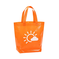 Sac à vêtements en non-tissé laminé avec sangle renforcée, logo personnalisé, emballage lourd pour vêtements