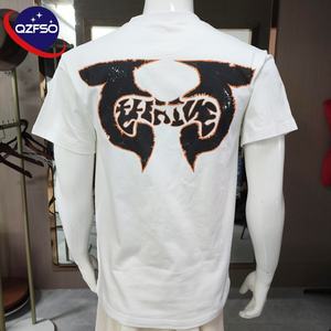 เสื้อยืดพิมพ์ลายวินเทจสำหรับผู้ชายเสื้อครอปแบบเปิดไหล่ตกเสื้อยืดแนวสตรีทผ้าฝ้าย100% ออกแบบได้ตามต้องการ - Product Image 2