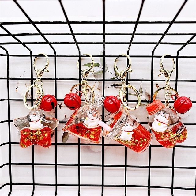 HOT Sale Cute Animal Shaped Water Floating Liquid Acrylic Keychain with Small Plastic Figure