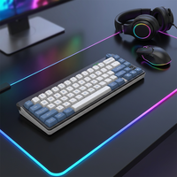 Clavier compact OEM mécanique triple mode 66 touches RGB 7 modes 2.4G/BT/Filaire USB/Type-C portable pour Gaming/Bureau
