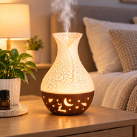 Diffuseur d'arômes et humidificateur d'air créatif en forme de vase étoilé ajouré