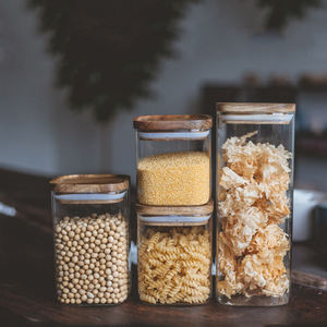 Vente en gros Récipients hermétiques pour aliments en borosilicate personnalisés Bocal de stockage en verre carré avec couvercle en bois d'<span class=keywords><strong>acacia</strong></span> pour la cuisine Épice salé - Product Image 3