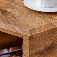 Table basse hexagonale moderne en bois foncé avec design de bord unique et étagère ouverte pour salon, mobilier de maison