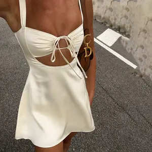 RUICHI seksi saten Hollow Out Tank Mini yaz Backless spagetti kayışı bağlı bir çizgi Mini elbise