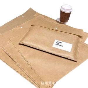Sac à vêtements en non-tissé kaki avec bouton pression, logo personnalisé, pour le rangement des vêtements et des documents - Product Image 4