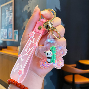 Porte-clés pendentif pour sac à dos et cartable, motif dessin animé mignon Sakura Panda, avec figurine enfant et bouteille de sable mouvant à huile, petit cadeau - Product Image 6