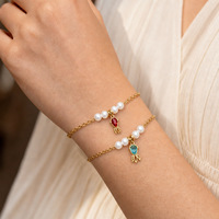Bracelet minimaliste en acier inoxydable hypoallergénique plaqué or 18 carats avec perle d'eau douce et zircon incrusté pour femmes Q329