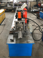 Machine de formage à froid pour volets roulants de garage, machine de fabrication de portes à lames métalliques, machine à lames de volets en mousse PU pour portes et fenêtres