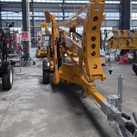 Plateforme élévatrice hydraulique remorquable pour travaux en hauteur, idéale pour les projets d'installation, de réparation et de rénovation en grande altitude