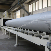 Qingdao Xinke passer à travers un grand tuyau d'acier externe propre industriel sablage convoyeur Type grenailleuse
