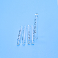 Bouteille en verre de parfum d'huile essentielle avec compte-gouttes de pipette graduée pour l'emballage cosmétique rond de crème pour le visage et de gouttes oculaires