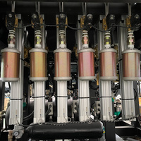 Machine de soufflage par étirage 6 cavités 700 ml Servo 7000 BPH pour bouteilles d'eau potable, changement rapide de moule en 30 minutes