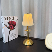 Lampe de chevet LED rechargeable à commande tactile, style rétro, avec couvercle en tissu métallique, motif nœud romantique, design créatif inspiré des célébrités, pour chambre à coucher, pour l'export.