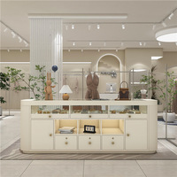 Présentoir de style européen pour bijoux et vêtements, vitrine de magasin, présentoir de montres en jade, table en verre fluide, blanc, personnalisable, LED