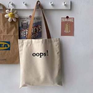 ถุงผ้าแคนวาสหูเชือกแบบออร์แกนิค รีไซเคิล พิมพ์โลโก้ตามสั่ง ขนาดตามต้องการ เป็นมิตรกับสิ่งแวดล้อม ใช้ซ้ำได้ เหมาะสำหรับใส่ของช้อปปิ้ง  ขั้นต่ำในการสั่งซื้อน้อย - Product Image 2