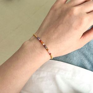 สร้อยข้อมือดีไซน์หรูหราประดับคริสตัลธรรมชาติหลากสีและจี้เพทาย 5A ชุบทองคำ 18K บนตัวเรือนเงินแท้จาก Dylam Light - Product Image 2
