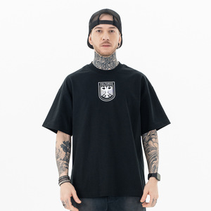 เสื้อยืดผ้าฝ้ายสีดำทรงหลวมแขนสั้นพิมพ์ลายกราฟิกคอกลมเสื้อยืดสตรีทแวร์ - Product Image 1