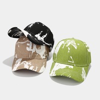 Casquettes de baseball unisexes sportives en tissu Oxford avec logo graffiti brodé et étiquette imprimée Chapeaux de papa à bord incurvé