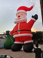 Modèle gonflable personnalisé de Père Noël mignon pour la décoration de la maison, idéal pour les fêtes de Noël et les événements en extérieur.