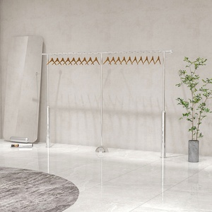 Étagère d'angle audacieuse de style <span class=keywords><strong>baroque</strong></span> en acier inoxydable à 2 niveaux, finition brillante, spéciale pour magasin de vêtements, présentoir pour vêtements pour femmes et enfants - Product Image 3