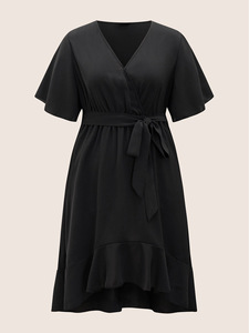 Venta al por mayor de gran tamaño de las mujeres Midi vestido negro sólido patrón alto bajo Streetwear volantes fajas decoración hecha sostenible Spandex - Product Image 6