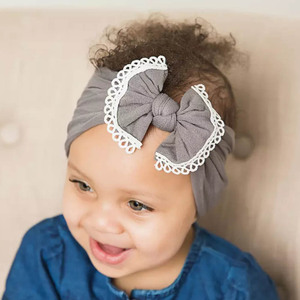 Accessoire pour <span class=keywords><strong>cheveux</strong></span> de bébé YiLove, style européen et américain, décontracté, nœud en nylon ultra-doux, bandeau pour enfants - Product Image 1