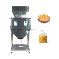 Machine de remplissage double tête haute performance 9999g grande capacité pour peser le riz, les céréales, les noix, les haricots, les fruits secs et les produits secs en vrac