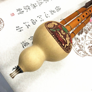 Wholesale Hulusi <b>musical</b> <b>instruments</b> for ethnic music. Available in C tuning and B flat tuning. Reasonable prices with case - Product Image 1