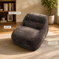 Fauteuil lounge individuel moderne en velours texturé marron foncé, sans accoudoirs, avec housse amovible et coussin lombaire, idéal pour salon ou maison d'hôtes