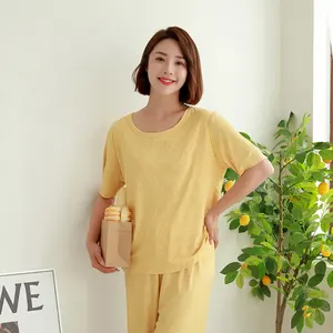 Cina fabbricazione pigiama set per gli uomini e le donne adolescenti estate sottile casual manica corta di grandi dimensioni tinta unita all'ingrosso