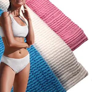 core spun yarn 37% nylon 63% high elastic seersucker knitted crinkle fabric for swimsuit bikini