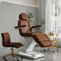 Table de massage électrique chauffante de luxe à 4 moteurs avec commande au pied pour salon de beauté moderne, spa, traitement cosmétique et salon de séjour